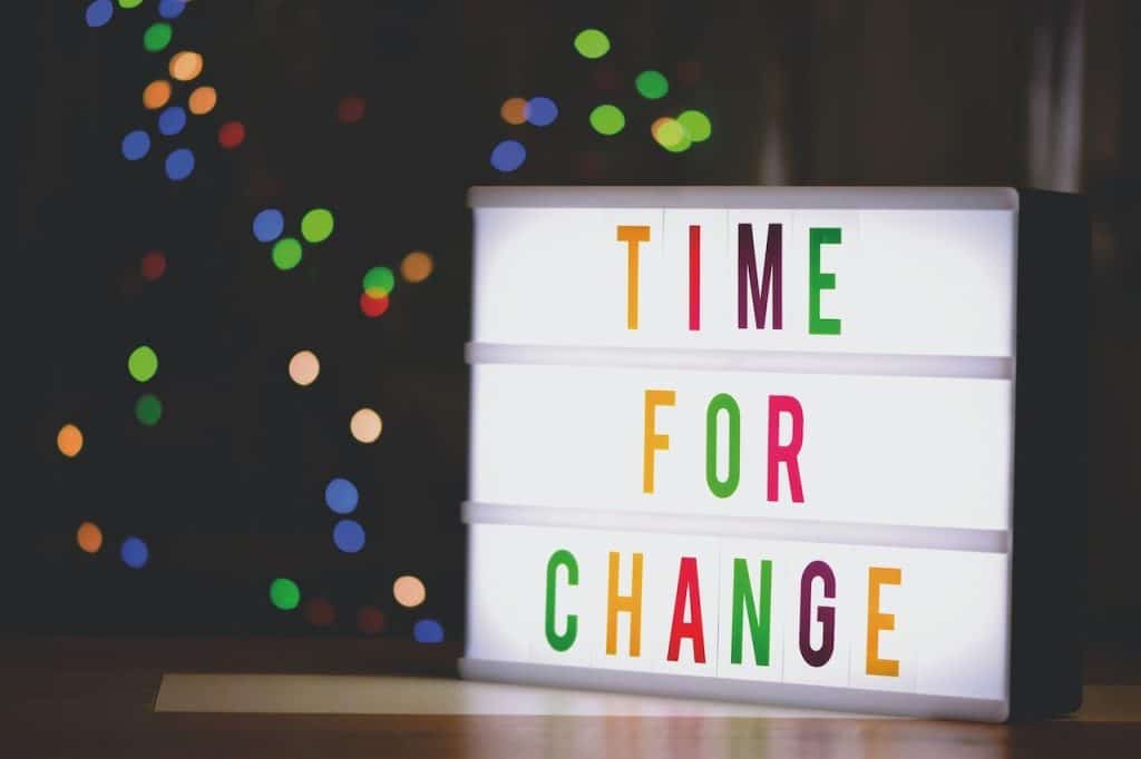 "Time for Change"-sign with colourful LED lights. Make time for a positive change in your business!